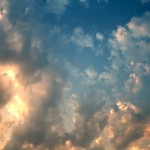 Golden clouds on blue sky