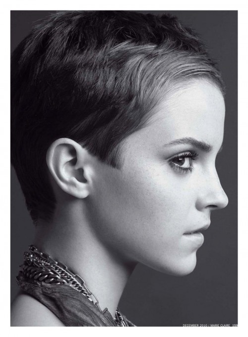 black white profile portrait of actress Emma Watson with very short hair
