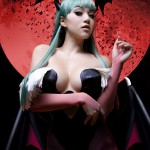 photograph of a woman cosplaying as Morrigan from the video game Darkstalkers