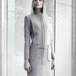 woman in a tailored grey suit