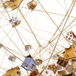 surreal painting of houses held together by a web of rope