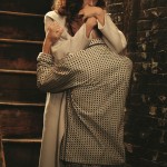 photograph of a woman hugging a man