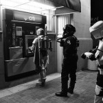 black & white photo of boba fett, imperial pilot and speeder pilot at ATM