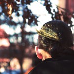 woman with paint smear on the back of her head