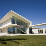 modern white house with orange-brown stripe