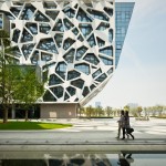 two women walking through courtyard of alibaba group headquarters in hangzhou china