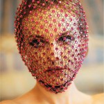 woman with red fishnet veil