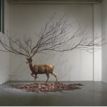 sculpture of deer with large antlers