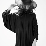 Photo of a robed girl in hat by Marcus Pritzi