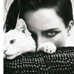 portrait of woman holding cat