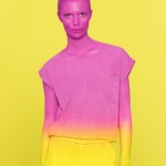 woman painted pink and yellow