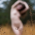 Defocused Nude model in a field