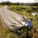 man dragging road