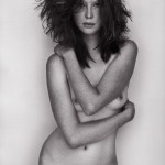 topless freckled woman in jeans