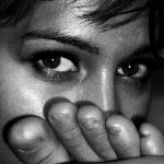 woman with toes in front of face