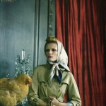 Edita Vilkeviciute poses in country clothing with a chicken in Vogue Nippon