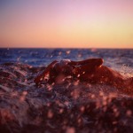 Nude in the surf by Aleksey Chizhik