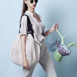 woman holding patterened reindeer head
