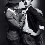 women in hats holding hands
