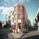 woman standing at fork in street