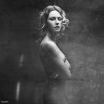 nude woman with folded arms