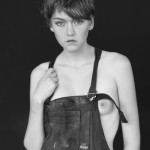 woman in overalls by peter coulson