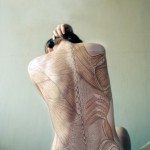 woman's back with anatomy drawing overlay