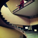 woman at top of spiral staircase