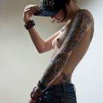 tattoo girl in cap