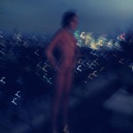 long exposure with light streaks, of nude woman and cityscape