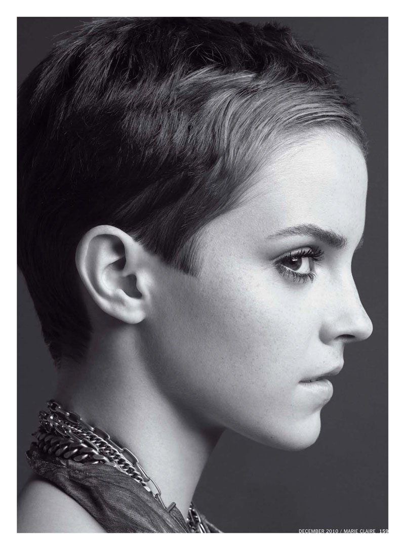 black & white profile portrait of actress Emma Watson with very short hair