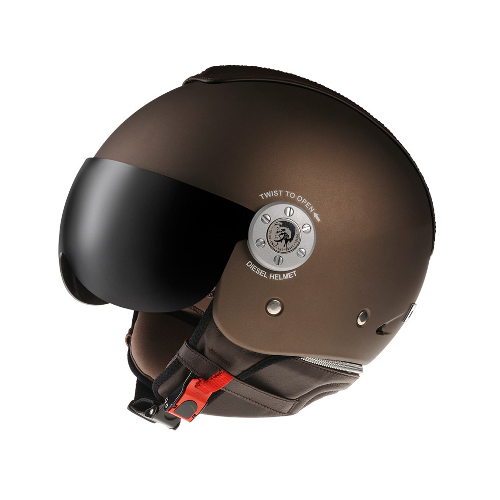 Product photograph of a brown motorcycle helmet with a red strap and tinted visor