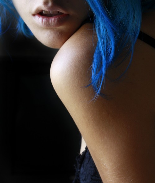 photograph of a girl with blue hair