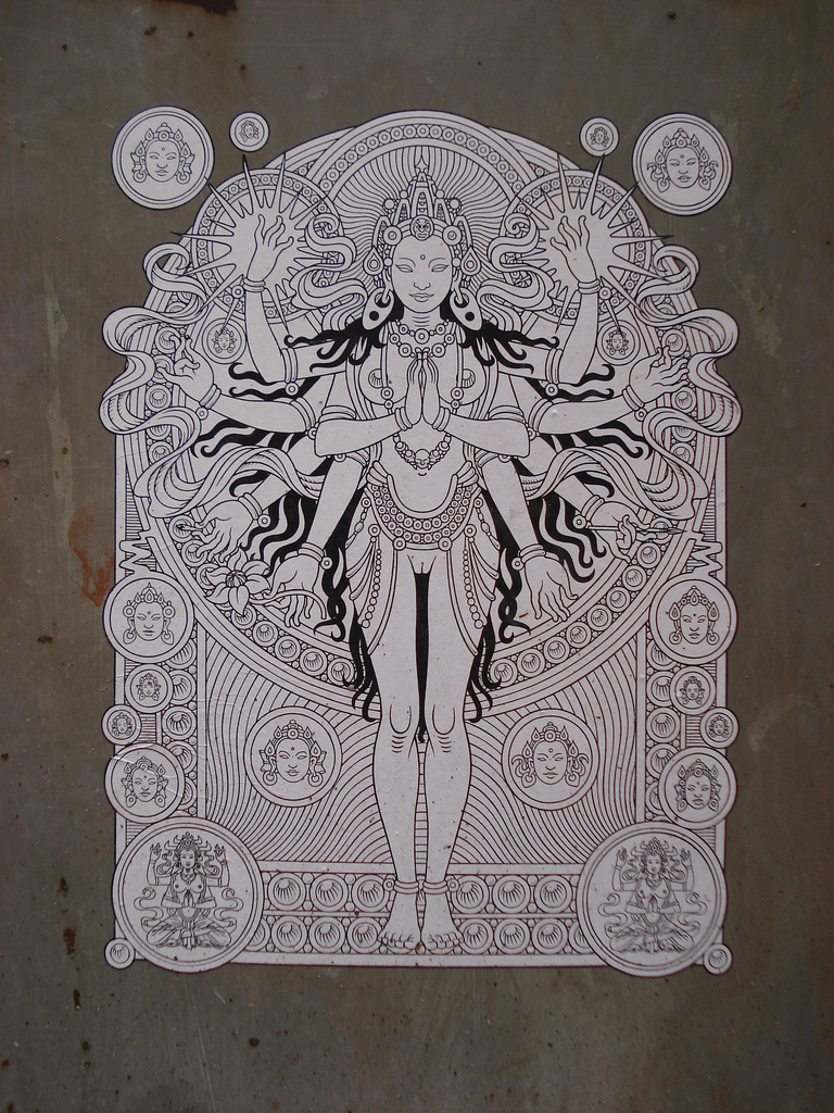 black & white illustration of a many armed goddess