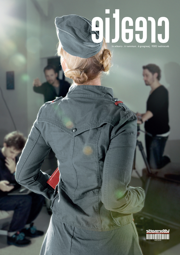 photograph of a magazine cover featuring the back of a model