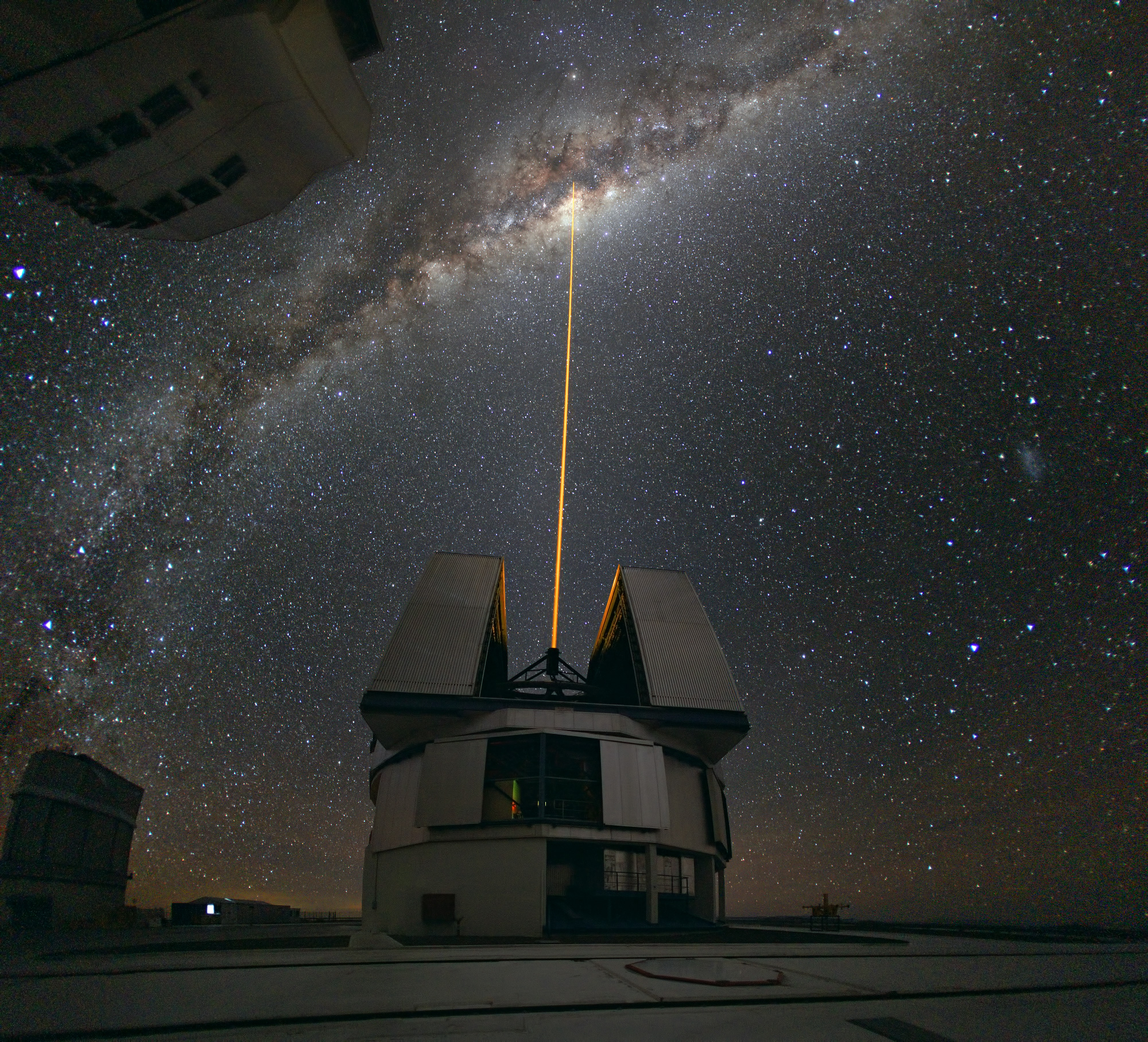 Very Large Telescope shooting a laser at the Milky Way