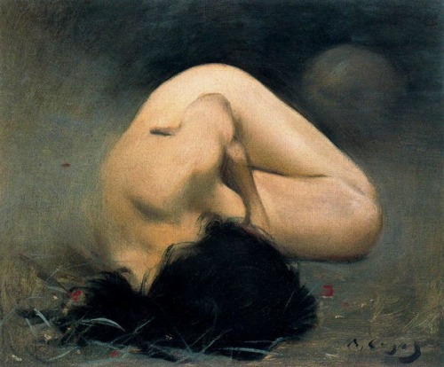 nude woman in foetal position