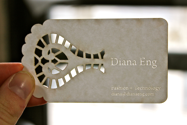 Lasercut business card, mildly burnt at the edges.