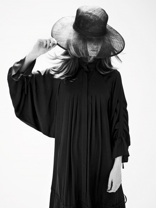 Photo of a robed girl in hat by Marcus Pritzi
