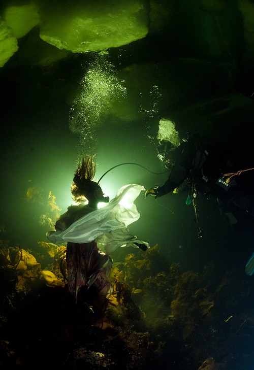 Photo of Natalia Avseenko catching her breath under the Arctic ice by Viktor Lyagushkin