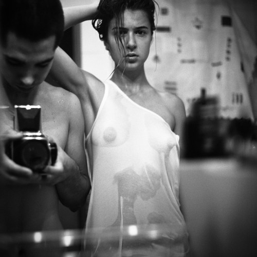 Wet t-shirt in the mirror by Aleksey Chizhik