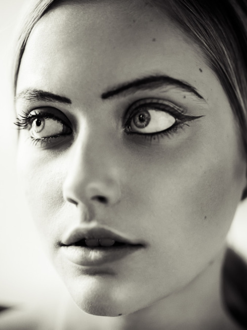 woman with heavy eye makeup close-up portrait
