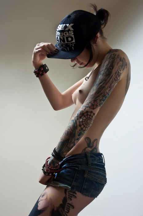 tattoo girl in cap