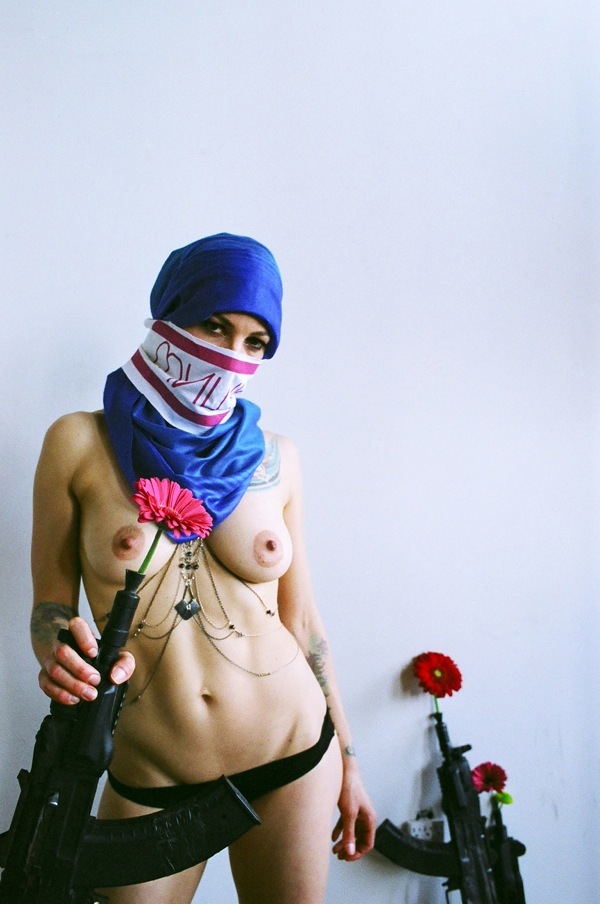 nude girl with guns - Belladona for Mishka NYC.